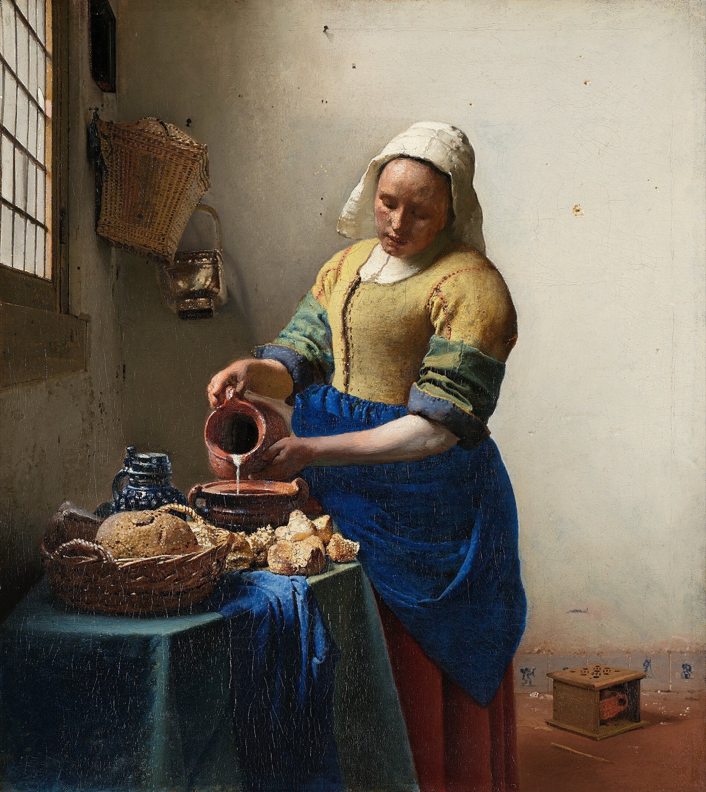 Johannes Vermeer《倒牛奶的女僕》c.1660，Rijksmuseum（公有領域）